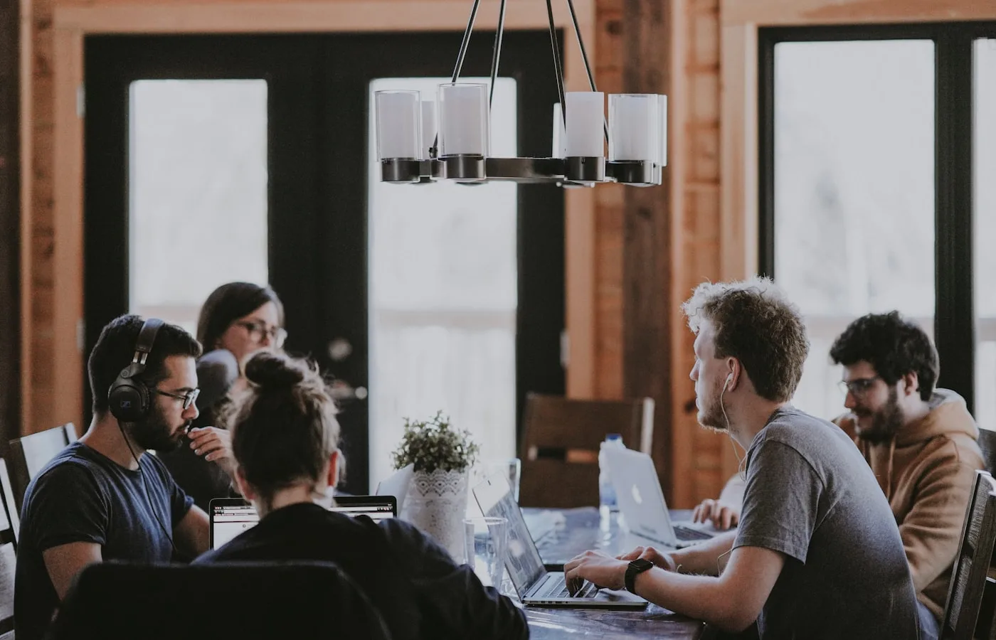Small team talking around a conference table